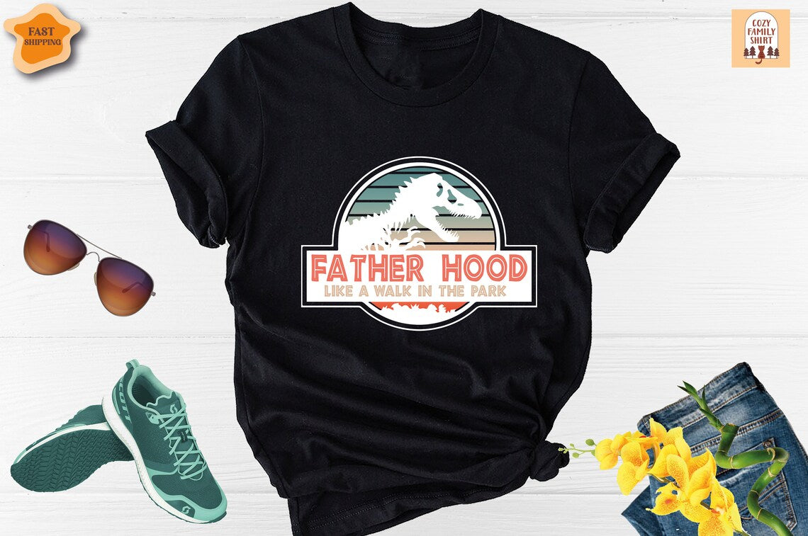 Unisex T-shirt Fatherhood is a Walk in the Park Shirt, Dadasaurus Shirt, Dinosaur Dad Shirt, Funny Dinosaur Daddy Shirt, New Dad Shirt, Father's Day Shirt