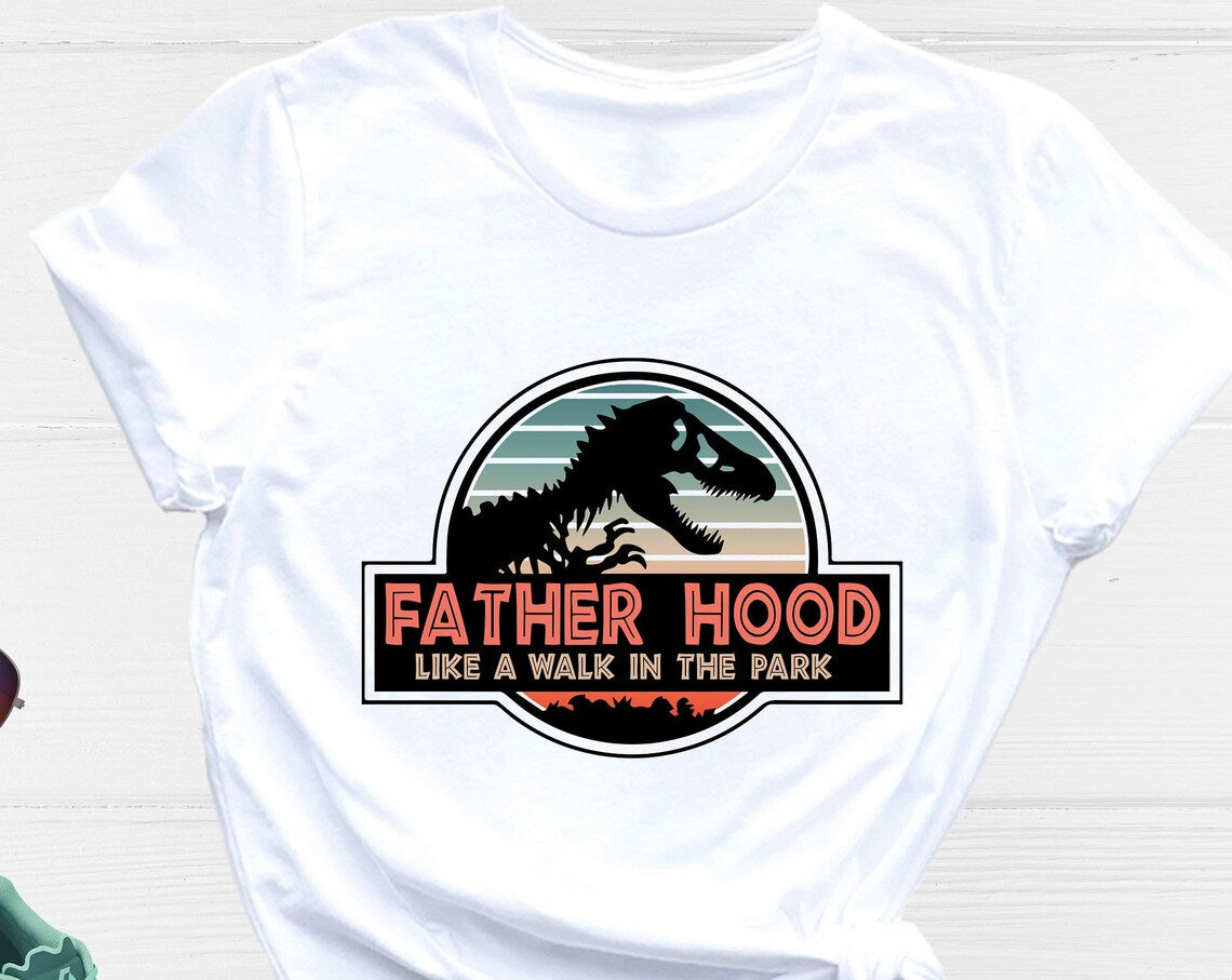 Unisex T-shirt Fatherhood is a Walk in the Park Shirt, Dadasaurus Shirt, Dinosaur Dad Shirt, Funny Dinosaur Daddy Shirt, New Dad Shirt, Father's Day Shirt